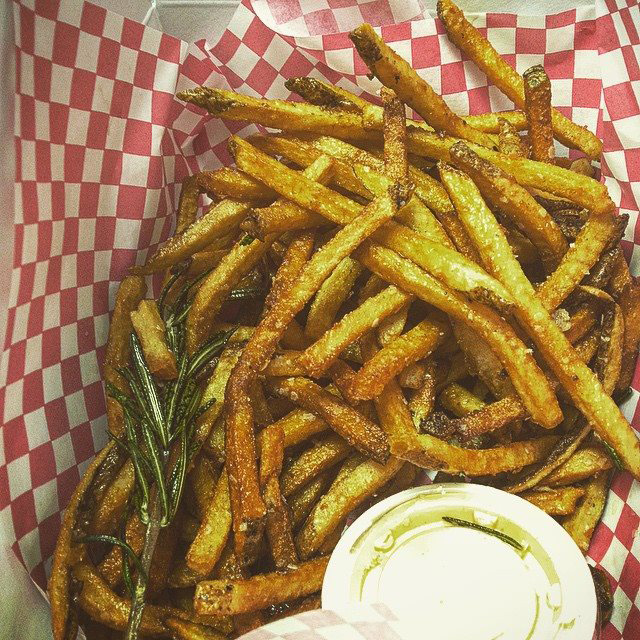 Garlic-rosemary fries with Sriracha mayo at Goods. Photo courtesy of Goods