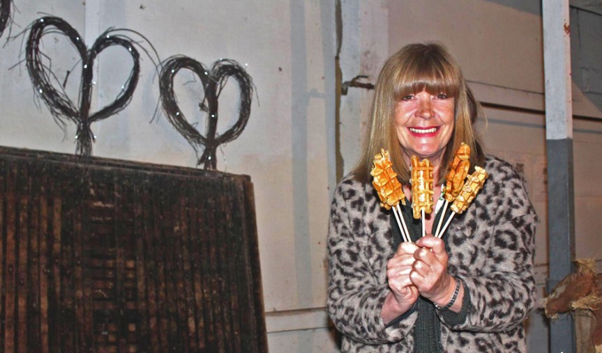Stick in the Mud proprietor Lizzie Douglas with her signature dessert at a recent tourism event. Photo via Lizzie's Pop Up Parties Facebook page