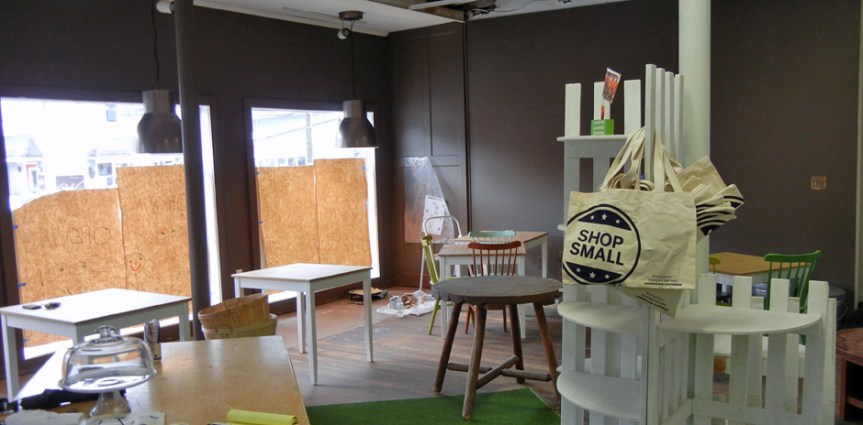New lights and tables are transforming a former shoe store into a grocery and cafe. Photo by Catskill Eats